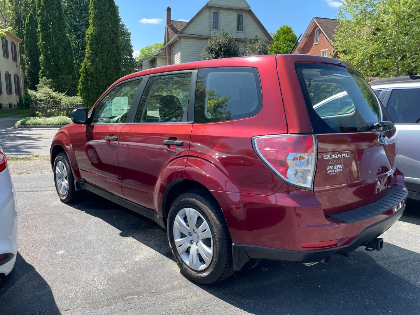 2009 Red Subaru Forester 2.5X (JF2SH61689H) with an 2.5L H4 SOHC 16V engine, 4-Speed Automatic Overdrive transmission, located at 101 N. Main Street, Muncy, PA, 17756, (570) 546-5462, 41.207691, -76.785942 - Photo#2